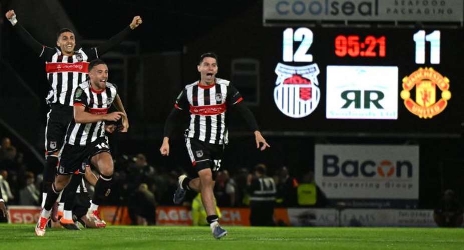 Manchester United knocked out of EFL Cup by Grimsby Town