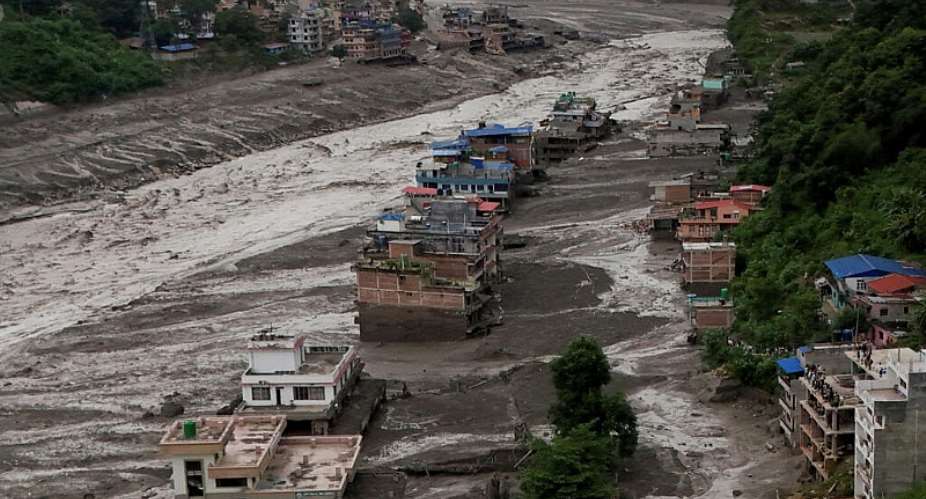 Mud covered buildings following a flash flood at Trishuli in Nepal, 26 August 2026. -  Navesh Chitraka/Reuters