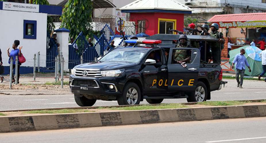 Police are seen in Abuja, Nigeria, on July 23, 2019. Nigerian publisher Agba Jalingo has been detained since August 22 without charge. ReutersAfolabi Sotunde