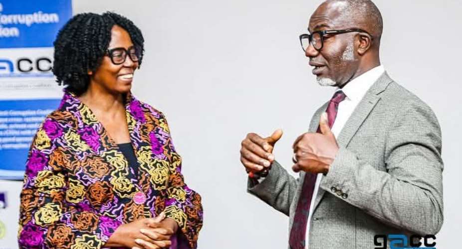 Beauty Emefa Narteh (Mrs) Executive Secretary Ghana Anti-Corruption Coalition   (left) having a conversation with Mr Frederick Lokko, Assistant Director of Audits and Information Officer of the Ghana Audit Service (right) during the 3-day media training workshop organised by the Ghana Anti-Corruption Coalition in Accra