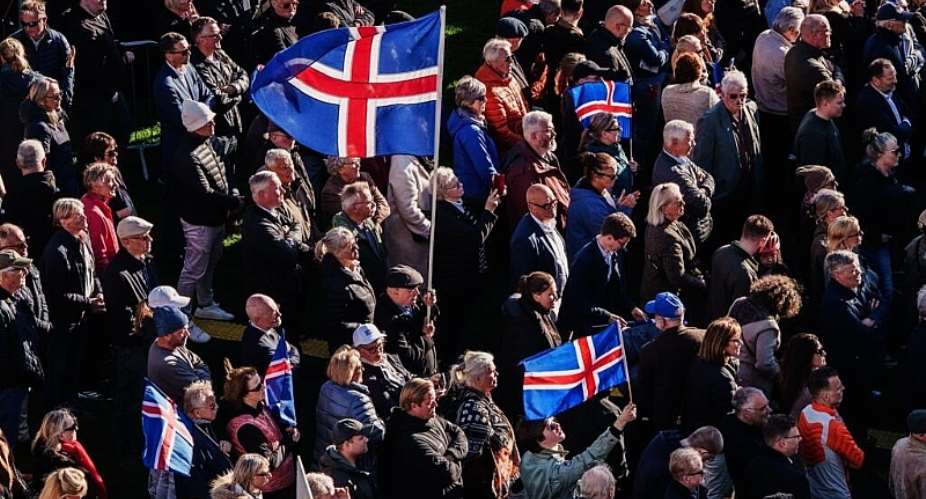 People with Icelandic flags attend an Afram Island, Forward, Iceland, rally, opposing the resumption of European Union accession talks at Austurvollur in Reykjavik on August 27, 2026. -  Marco Di Marco, AP
