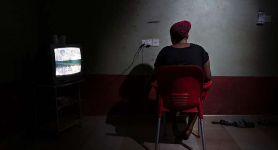 Blessing, a 26-year-old from Nigeria, inside the guesthouse where she lives with other 20 women who were also forced into prostitution Francesco BellinaAl Jazeera