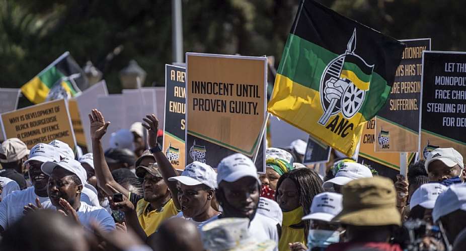 ANC supporters show support for corruption accused and suspended party secretary general Ace Magashule outside court in Bleomfontein. - Source: EFE-EPAConrad Bornman