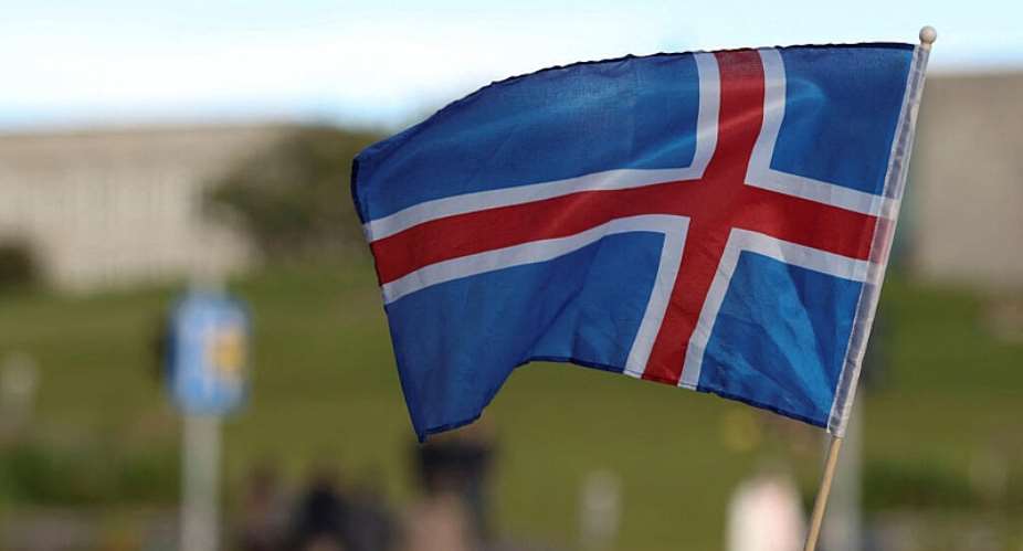 An Icelandic flag flutters in a street ahead of a referendum on whether Iceland should resume accession negotiations with the European Union, in Reykjavik, Iceland, August 29, 2026. -  Leonhard Foeger, Reuters