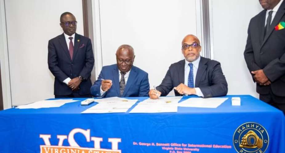 Photo: VSU and KNUST representatives signing the historic partnership /  Manhyia Palace