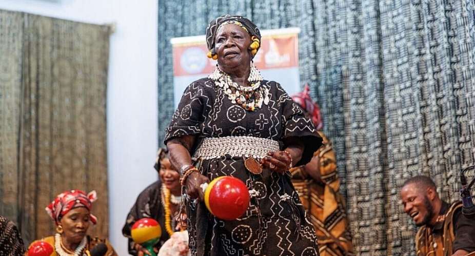 Malian singer, dancer and instrumentalist Mariam Bagayoko dances while performing at the Palais de la Culture in Bamako on 14 August, 2026. - AFP - -