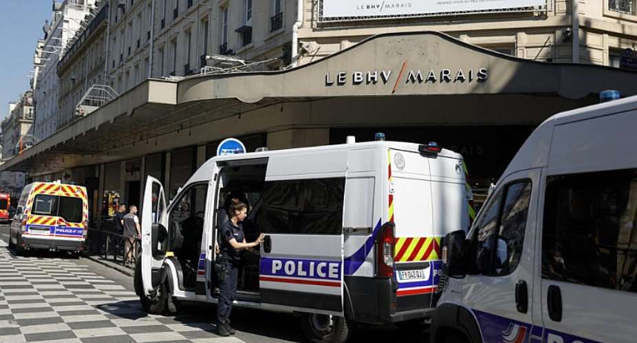 Police vans outside the BHV Marais department store in Paris, on June 25, 2024. -  Geoffroy van der Hasselt, AFP