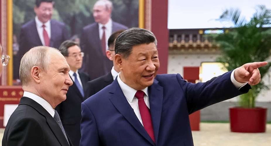 File photo: Russian President Vladimir Putin, left, and Chinese President Xi Jinping visit an exhibition by the TASS and Xinhua news agencies at the Great Hall of the People, in Beijing, China, May 20, 2026. -  Alexander Kazakov/Pool Sputnik K
