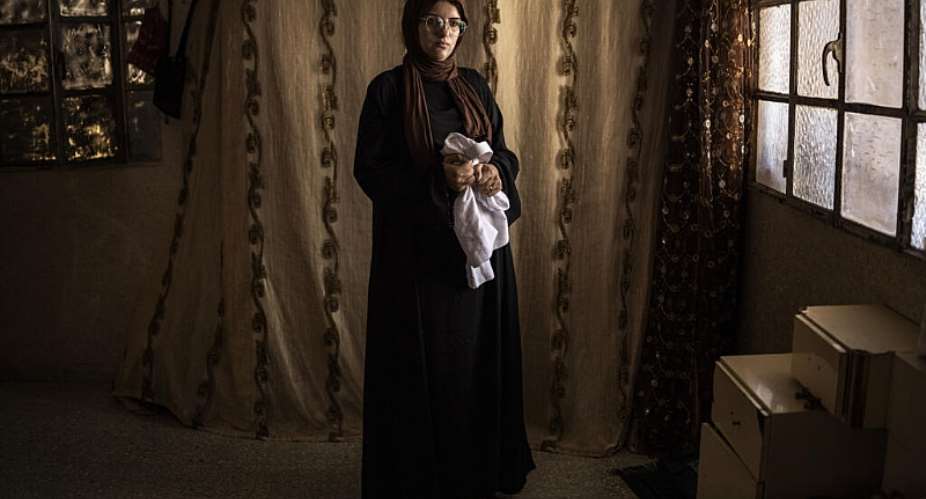 Alia al-Hallaq said she still couldnt accept the death of her nine-year-old, Mohammed -  JOHN WESSELS / AFP