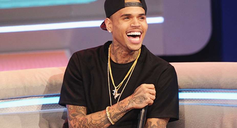 Singer Chris Brown Arrested For Pointing Gun At Woman