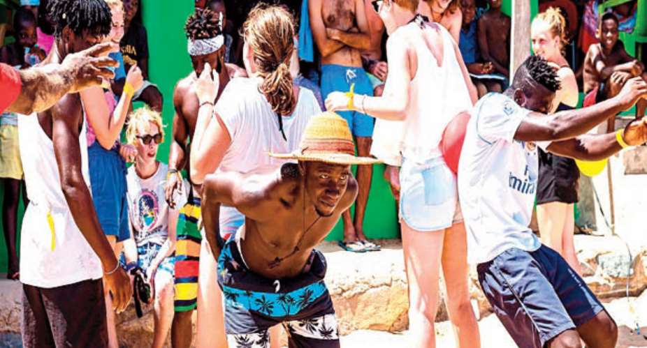 Visitors having fun at the Busua