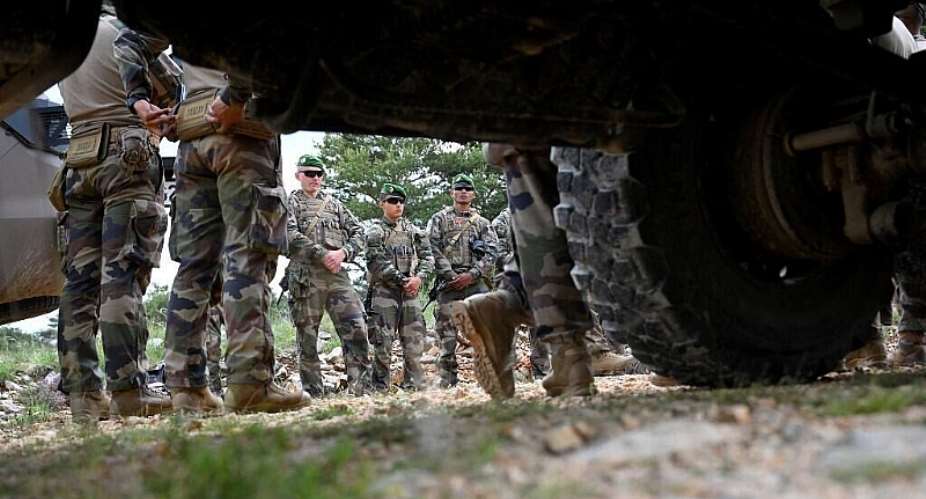 Soldiers from the Foreign Legion attend a briefing during a training exercise at military grounds in Canjuers, in 2024. - AFP - NICOLAS TUCAT