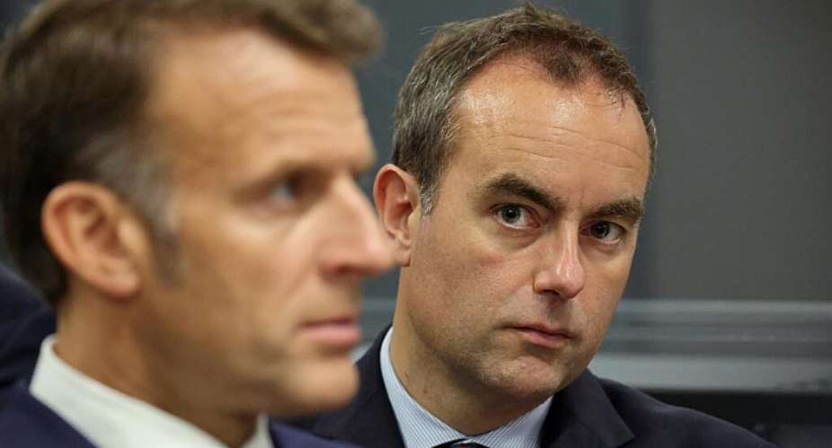 French Prime Minister Sbastien Lecornu (right) looks on as President Emmanuel Macron speaks on 22 May 2026. -  Ludovic Marin / POOL AFP via AP