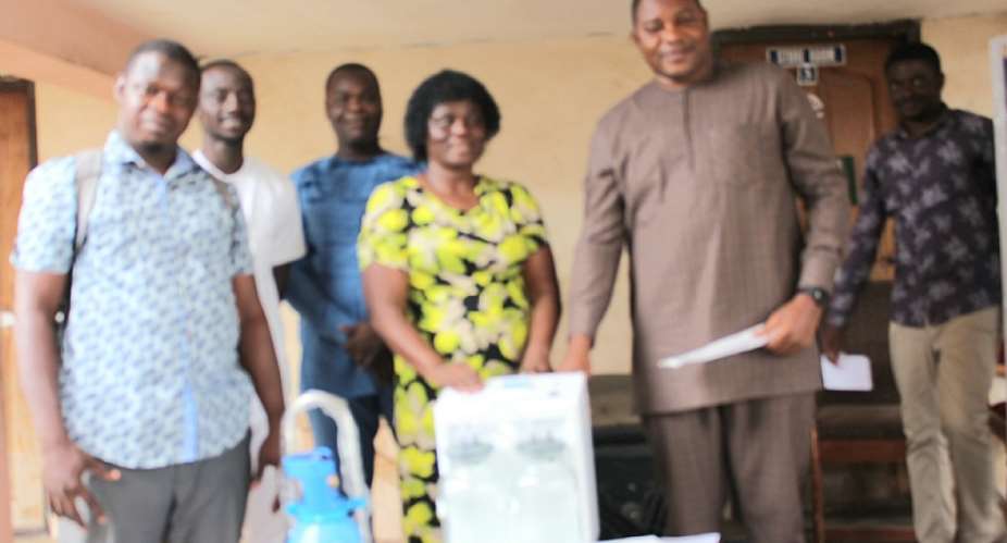 Obuasi MCE presents medical equipment to the Sanso Health Centre