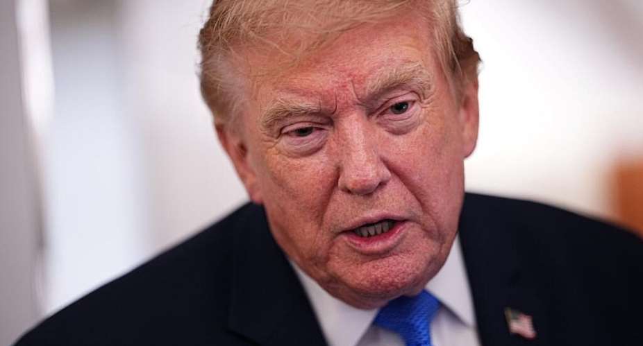 Trump told reporters aboard Air Force One that the support for Japan would ultimately benefit the US -  Aaron Schwartz, AFP