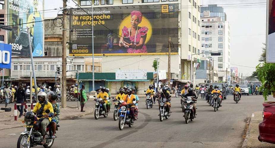 Traffic keeps moving in Cotonou, a day after Benin’s armed forces thwarted the attempted coup against the government of President Patrice Talon, on 8 December, 2025. - REUTERS - Charles Placide Tossou