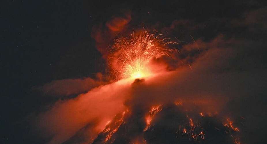 Fuego erupted on Monday morning and by nightfall it intensified, with lava flows and huge plumes of gas and ash spewed into the air. -  Johan Ordonez, AFP