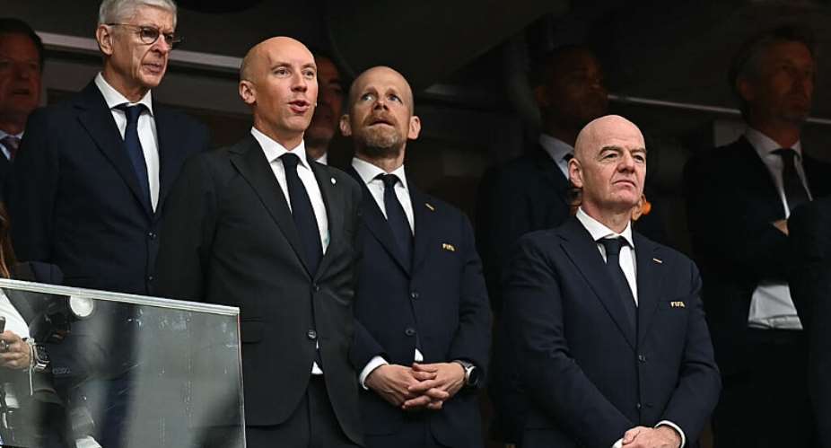 Gianni Infantino has been heavily criticised by former FIFA allies Arsene Wenger (4L) and secretary-general Mattias Grafstrom (2R) -  Paul Ellis, AFP