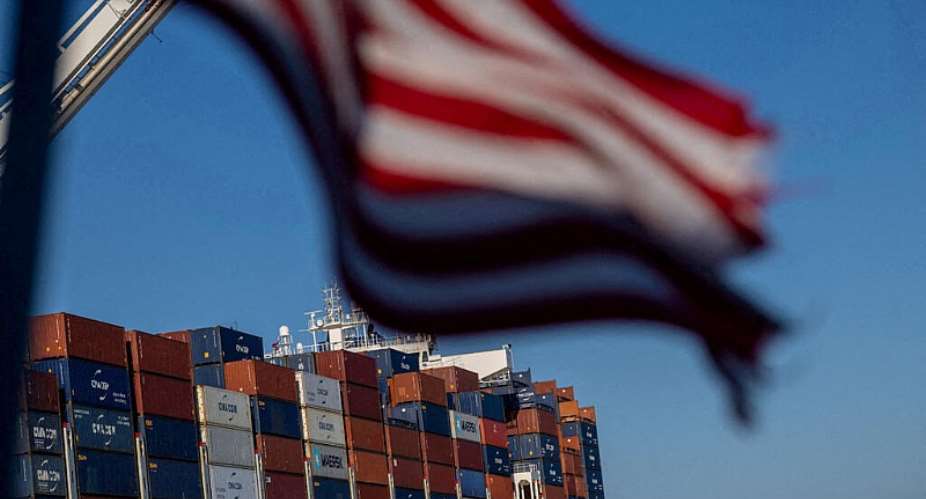 A cargo ship full of shipping containers is seen at the port of Oakland, California, 4 August 2025. -  Carlos Barria, Reuters