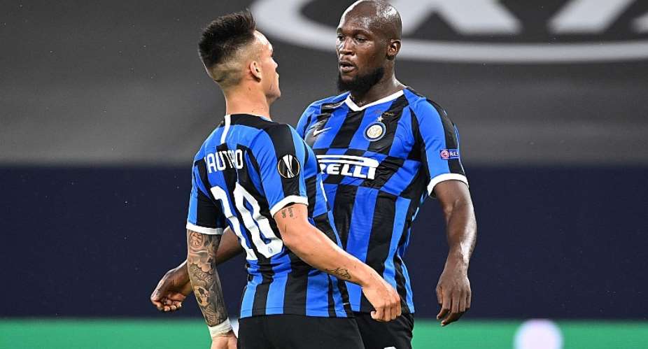 Romelu Lukaku of Inter Milan celebrates after scoring his sides first goal with Lautaro Martnez during the UEFA Europa League round of 16 single-leg match between FC Internazionale and Getafe CF at Arena AufSchalke on August 05, 2020 in Gelsenkirchen, GeImage credit: Getty Images