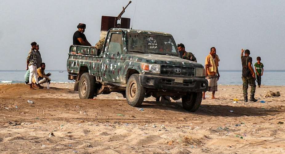 A technical is pictured as fighters supporting the Aden-based internationally-recognised Yemeni government gather during a vigil along the Red Sea shore in Khokha, in Yemens western Hodeidah province on July 20, 2026. -  Khaled Ziad, AFP
