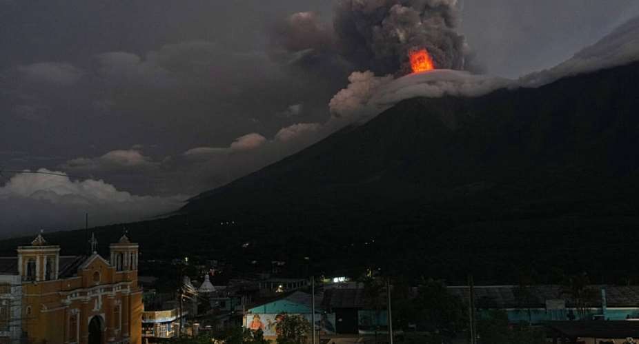 Lava flows and clouds of ash out of the crater of the Fuego Volcano, as seen from San Juan Alotenango, Guatemala, 4 August 2026. -  Moises Castillo, AP