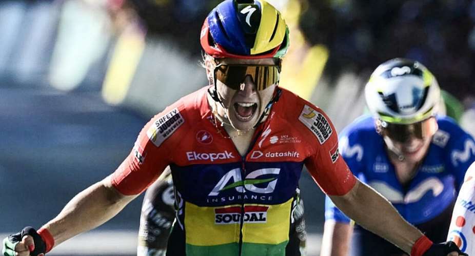 Mauritian rider Kim Le Court celebrates as she crosses the finish line to win stage six of the Tour de France Femmes. -  Nicolas Tucat, AFP