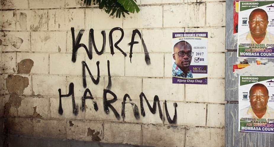 Graffiti in Muslim-dominated Mombasa rallies against the 2017 election with the Kiswahili slogan amp;quot;Kura ni Haramuamp;quot; amp;quot;voting is haramprohibittedamp;quot;. - Source: Photo by Janer Murikirapicture alliance via Getty Images