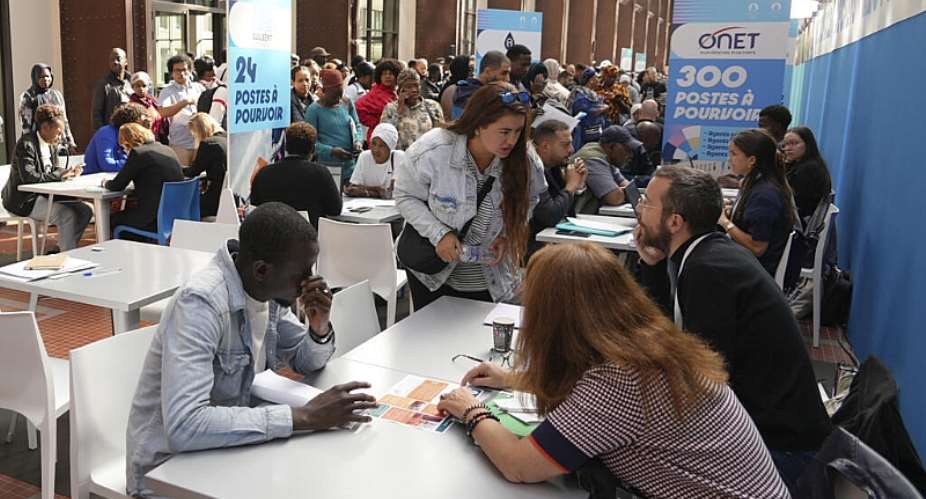 People queue for information at a jobs fair in Saint-Denis just outside Paris. Frances national statistics agency reported that the countrys unemployment rate rose by 0.2 percentage points in the second quarter to 8.3 percent, its highest level since autumn 2020. - AP - Nicolas Garriga