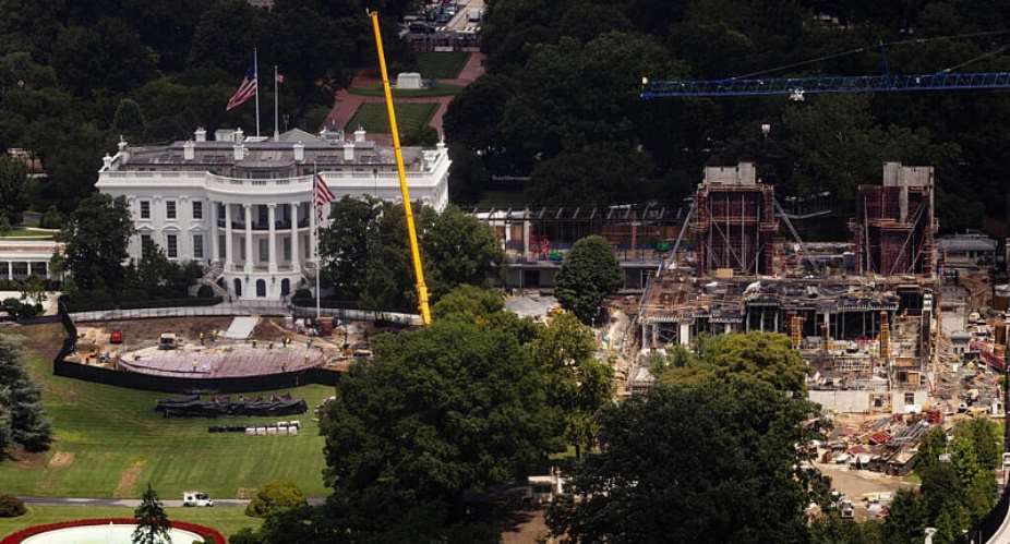 Construction work continues on a helipad and the White House Ballroom on the South Lawn of the White House on August 5, 2026, in Washington. -  Tierney L. Cross, AP