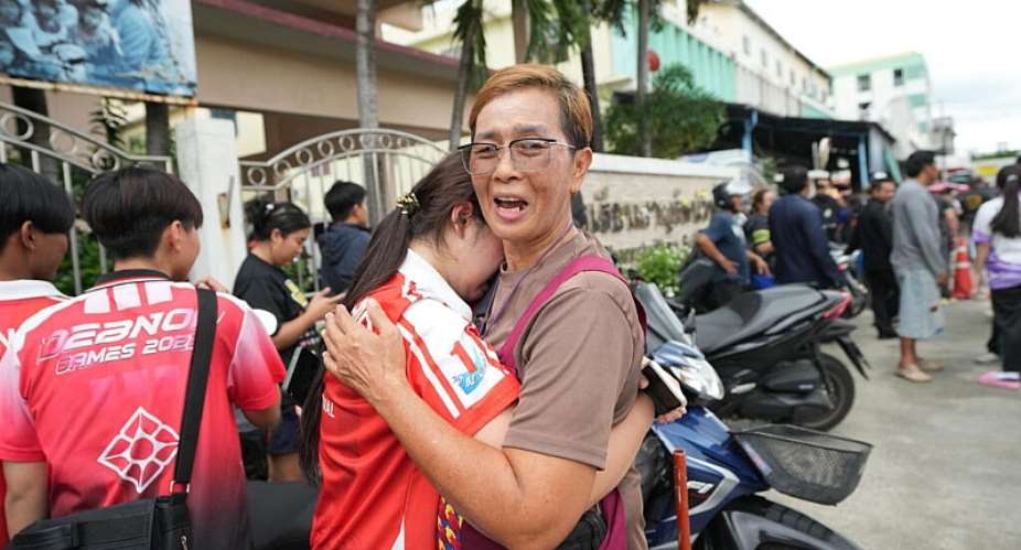 A schoolgirl cries outside her school where deaths and injuries were reported after a shooting in Thailands Nonthaburi province, August 7, 2026. -  Sakchai Lalit, AP
