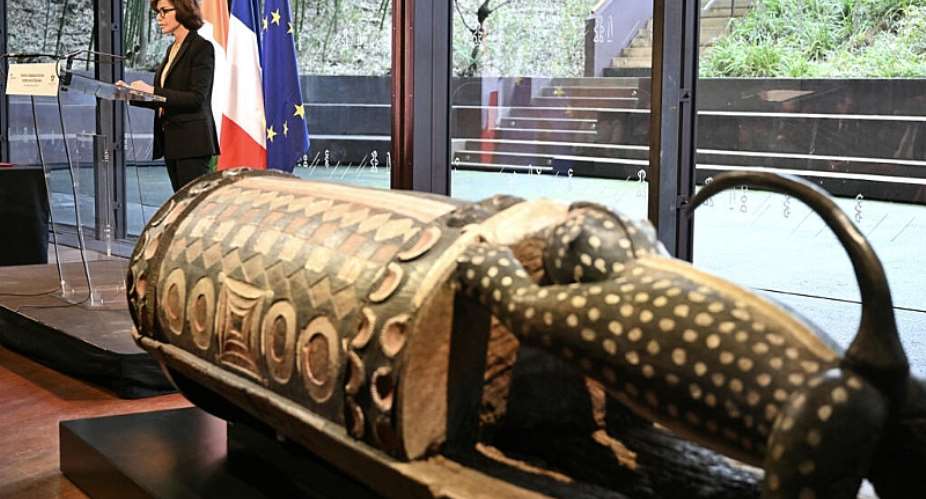Frances Culture Minister Rachida Dati addresses the audience during a ceremony for the official restitution to the Republic of Cote dIvoire of the sacred talking drum Djidji Ayokwe, confiscated in 1916 by French colonial authorities from the Ebrie people, at the Musee du Quai Branly in Paris on 20 February 2026. - AFP - BERTRAND GUAY