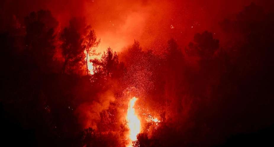 Flames and smoke rise during a wildfire near Montfort-sur-Argens, in the Var department of southern France, on 1 August 2026. -  REUTERS - Manon Cruz