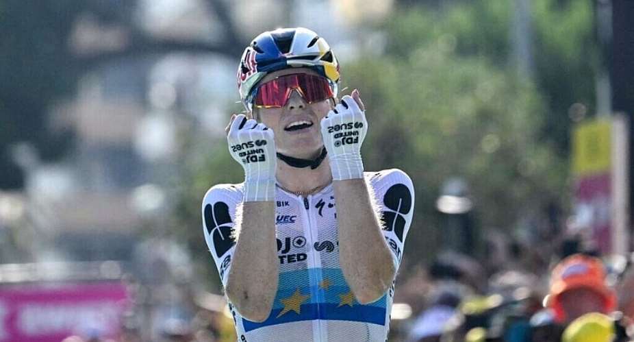 FDJ-SUEZs Dutch rider Demi Vollering celebrates as she crosses the finish line to win the 8th (out of 9) stage of the fifth edition of the Womens Tour de France cycling race, 171.9 km from Sisteron to Nice, in Nice, southeastern France on 8 August, 2026. - AFP - NICOLAS TUCAT
