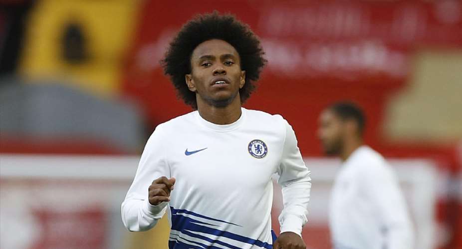 Willian of Chelsea warms up prior to during the Premier League match between Liverpool FC and Chelsea FC at Anfield on July 22, 2020 in Liverpool, England. Image credit: Getty Images