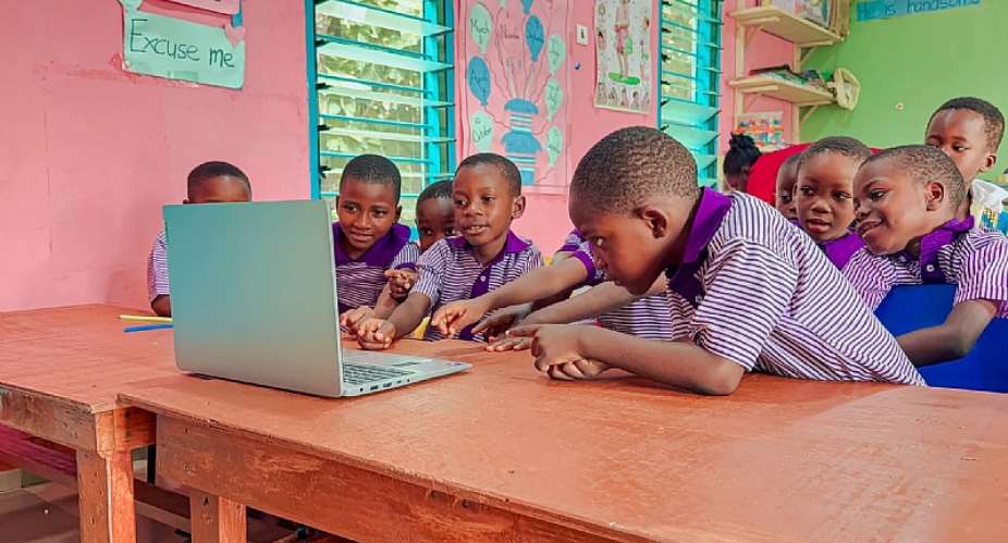 Pupils of Impact Hub Academy having computer lessons after the installation of the Internet Device by Friends of Adaklu