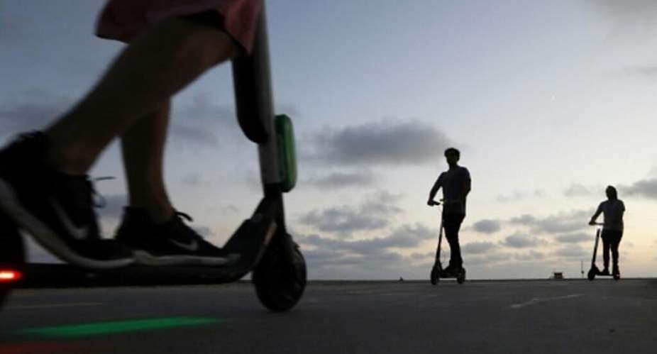 Electric scooter riders in Paris must now wear helmets and reflective gear under new rules introduced after a significant rise in injuries involving the two-wheelers, police said on Saturday, 8 August, 2026. - GETTY/AFP/File