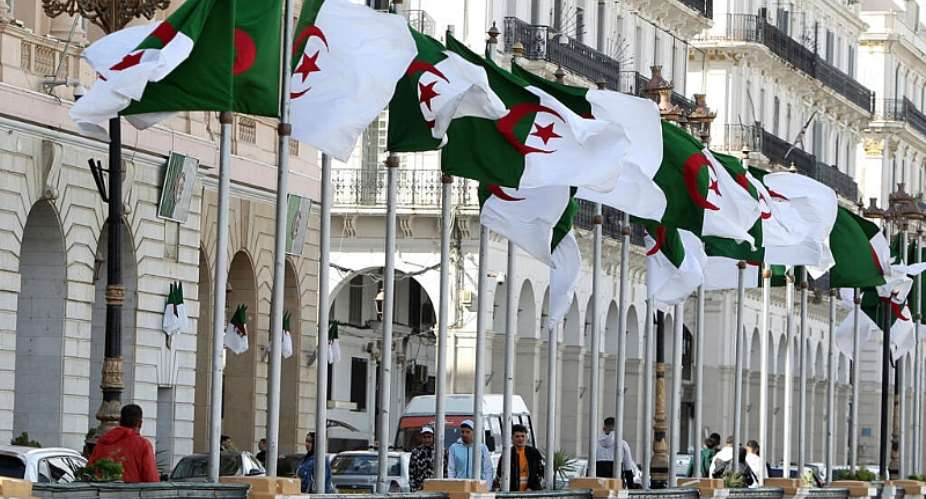 Algerian flags fly in Algiers on 16 April 2025. Algeria cut diplomatic ties with the United Arab Emirates on 10 September 2026 after years of tensions between the two countries. - AP - Fateh Guidoum