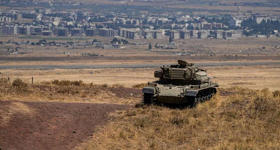 File photo: An Israeli tank stands in position near the ceasefire line between the Israeli-occupied Golan Heights and Syria as seen from the Israeli side on August 20, 2026. -  Ayal Margolin, Reuters