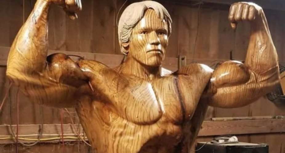Artist Carves Incredible Life-Size Sculpture Of Arnold Schwarzenegger Out Of Tree Trunk