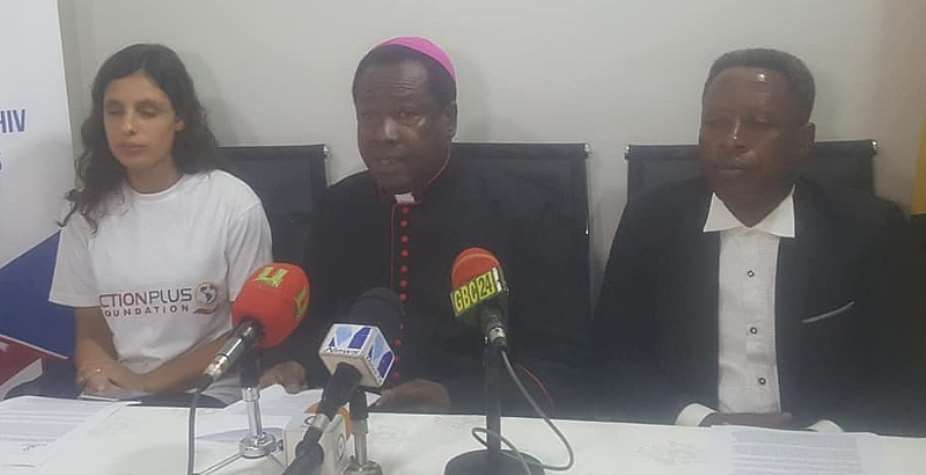 Apostle Fred Annim with Yasmin Dunkley left addressing the media