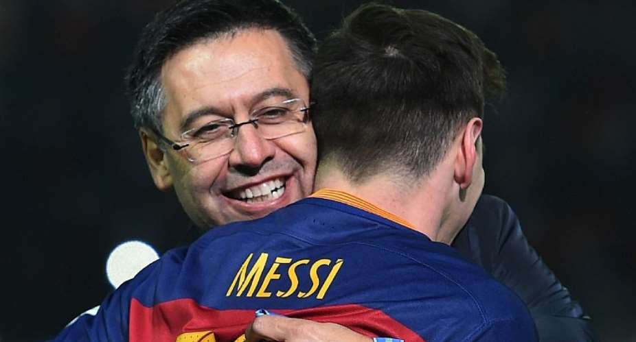 Josep Maria Bartomeu and Lionel Messi