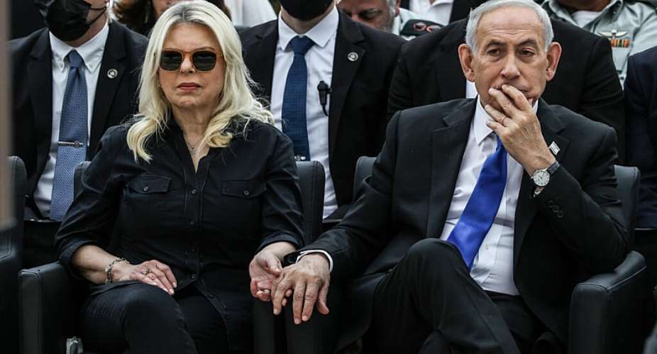 Israels Prime Minister Benjamin Netanyahu, right, and his wife Sara attend a ceremony commemorating Israels Remembrance Day for fallen soldiers, or Yom HaZikaron, at the Military Cemetery on Mount Herzl in Jerusalem, Tuesday April 21, 2026. -  Ilia Yefimovich, AP