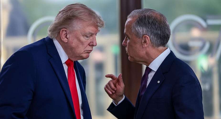 US President Donald Trump speaks with Canadian Prime Minister Mark Carney during a G7 working lunch in Evian-les-Bains, France, on 16 June 2026. The two countries have clashed over trade issues including Quebecs protections for French language and culture. -  (Evelyn Hockstein/Pool Photo via AP