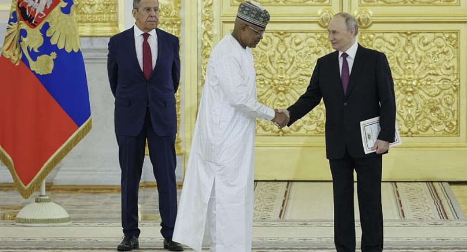 Russian President Vladimir Putin with Nigers ambassador in Russia Abdou Sidikou Issa at the Aleksandrovsky Hall of the Great Kremlin Palace on November 5, 2024. -  Yuri Kochetkov, AFP