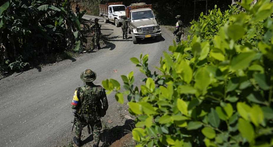 Members of the EMC rebel group that broke away from the former Revolutionary Armed Forces of Colombia, or FARC, operate a checkpoint in the Micay Canyon region, southwestern Colombia, Wednesday, August 14, 2024. -  Fernando Vergara, AP