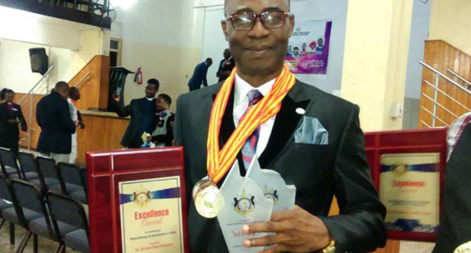 Dr Brown Osei Konadu-Yiadom after receiving the award