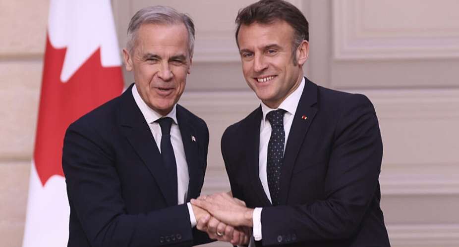 French President Emmanuel Macron, right, and Canadas Prime Minister Mark Carney shake hands after a joint statement Monday, March 17, 2025 at the Elysee Palace in Paris. - AP - Thomas Padilla