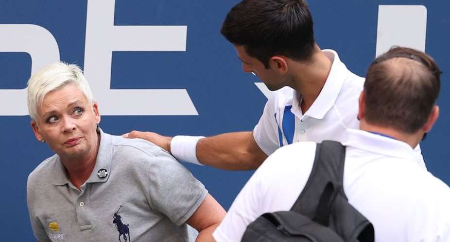 Djokovic debated with officials at the net before being disqualified from the US Open