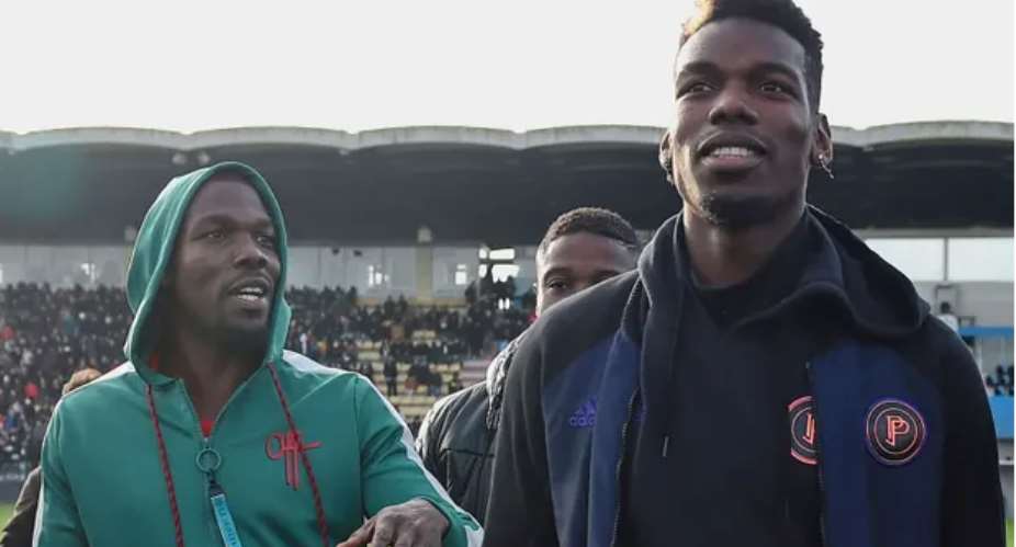Mathias Pogba (left) pictured with Paul Pogba in 2019, has reportedly been temporarily detained in France. Photograph: Guillaume Souvant/AFP/Getty Images